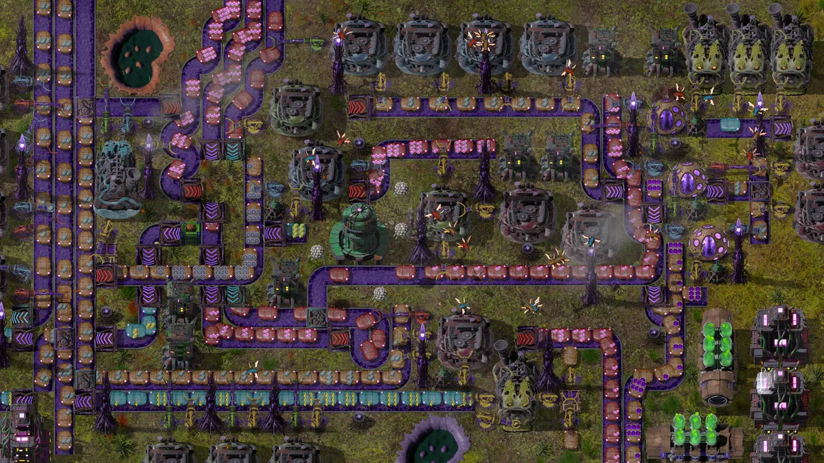 Swarmdustry promotional screenshot showing purple transport paths, rows of structures and winged creatures.